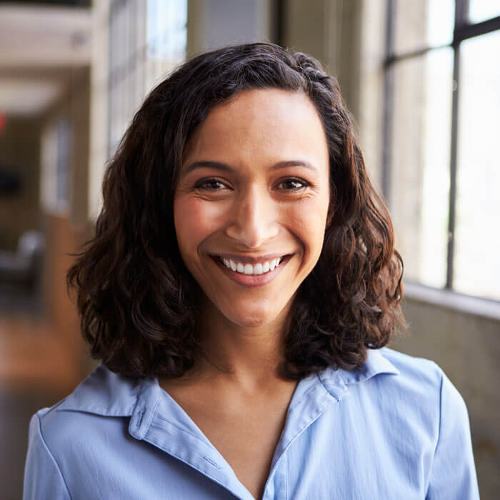 woman smiling in office